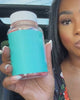 The bottle held in hand