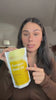 Pointing at the cold-pressed label on the pouch